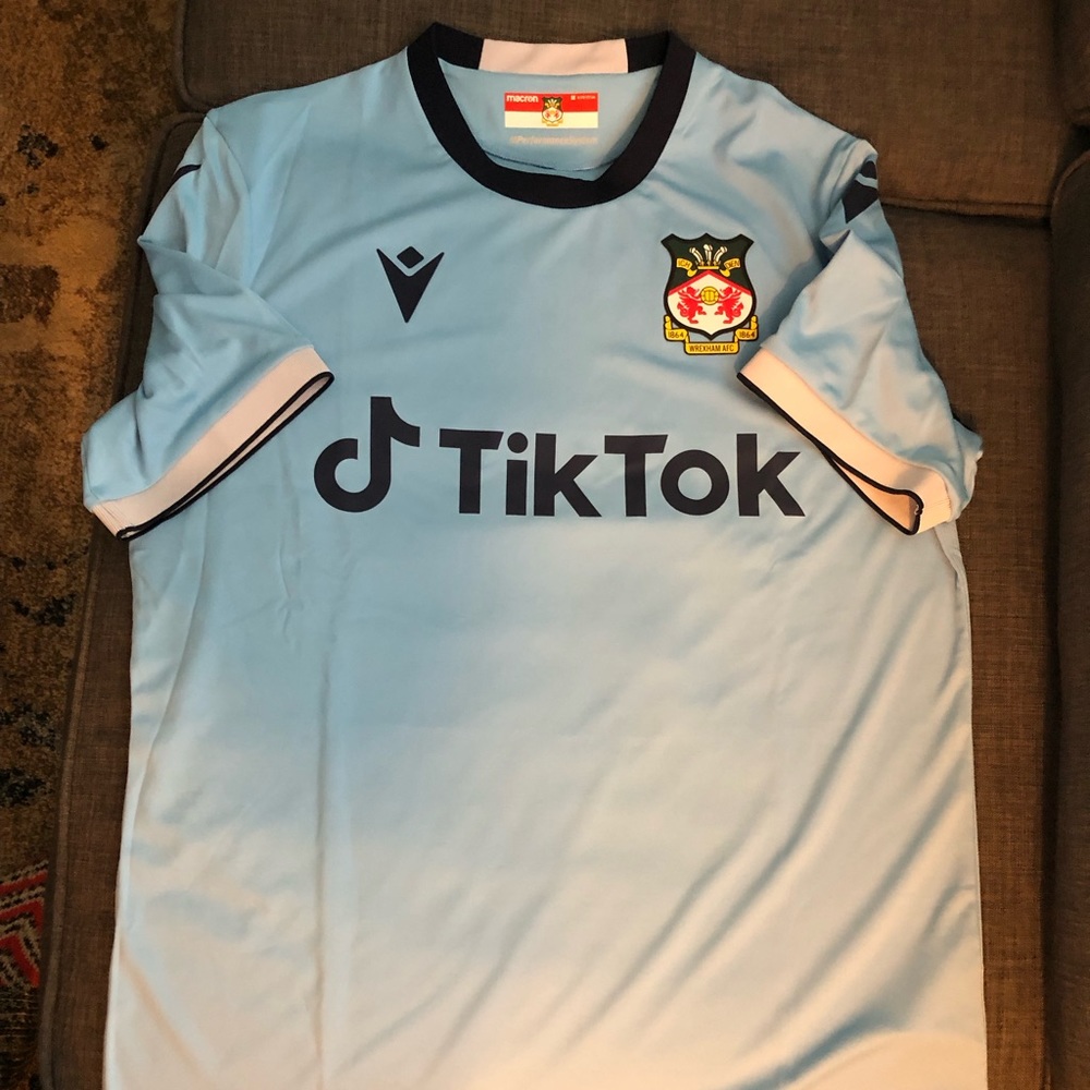 New with tags. Wrexham FC match day away shirt. Mens size Medium.